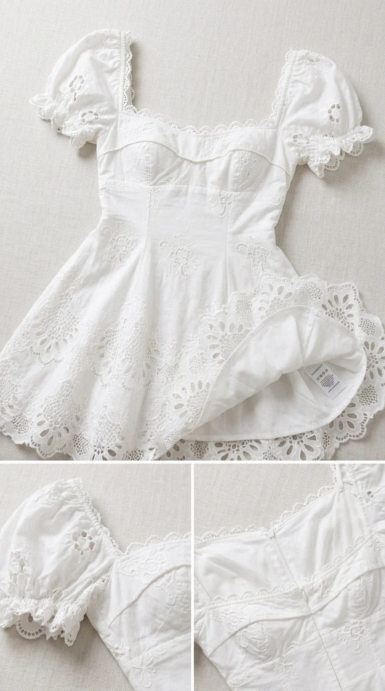 Flat lay close-up view showing the neckline, bustier cups, lining, and embroidery details of the white dress