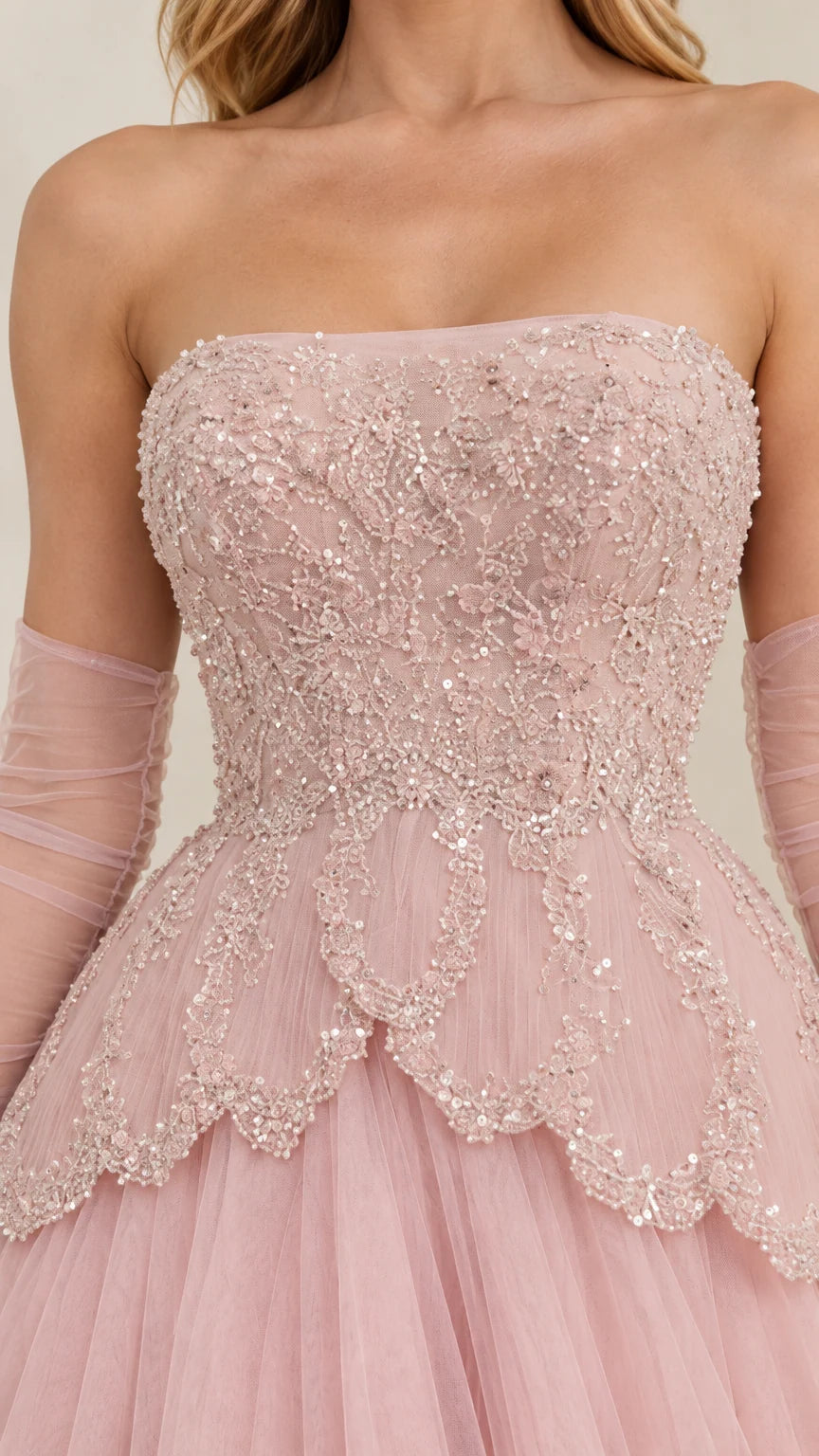 Close-up detail of Blush Pink beaded and embroidered bodice with scalloped waistline
