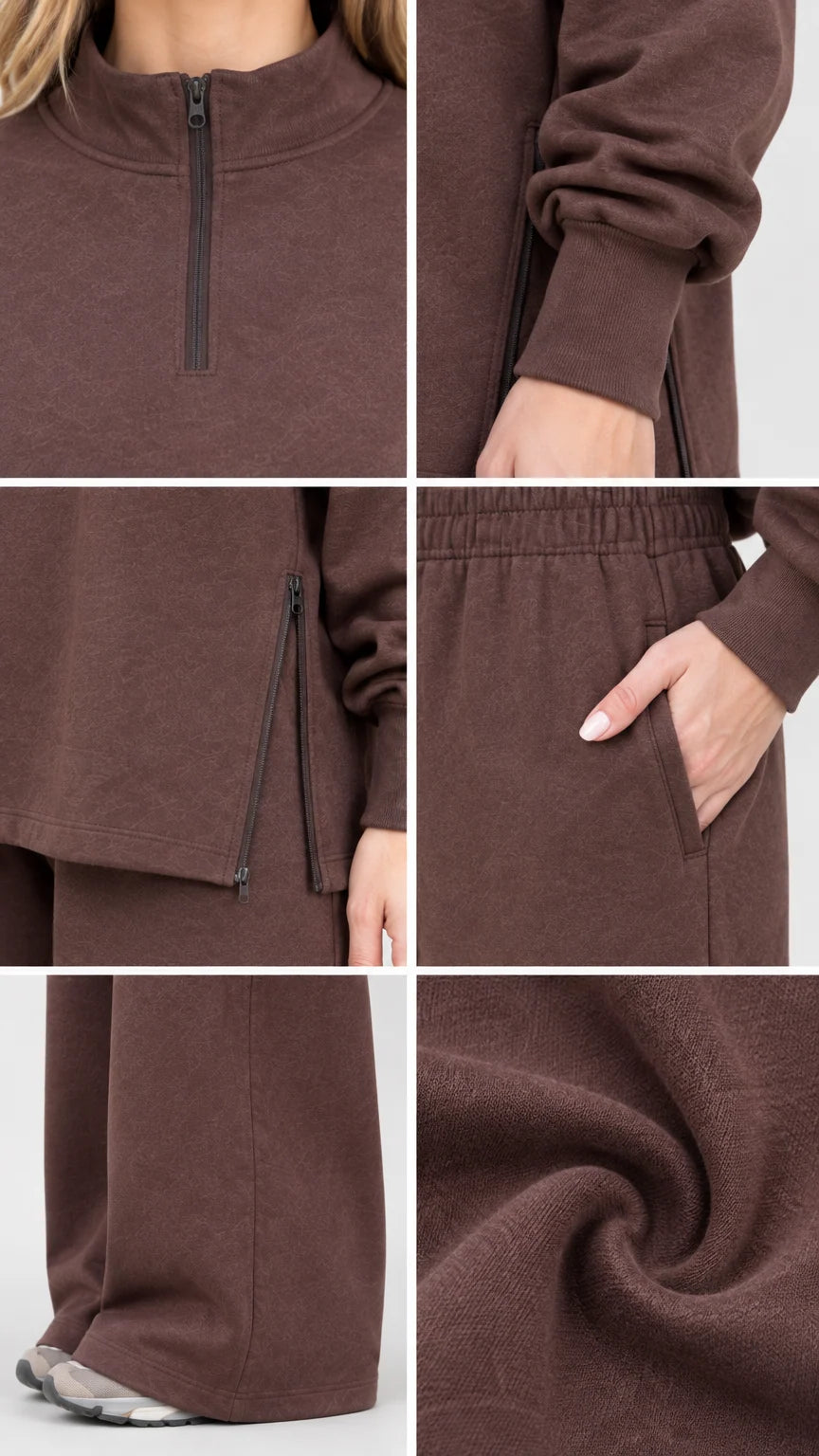 Close-up details of quarter-zip collar, side zipper hem, pocket, and soft fleece texture