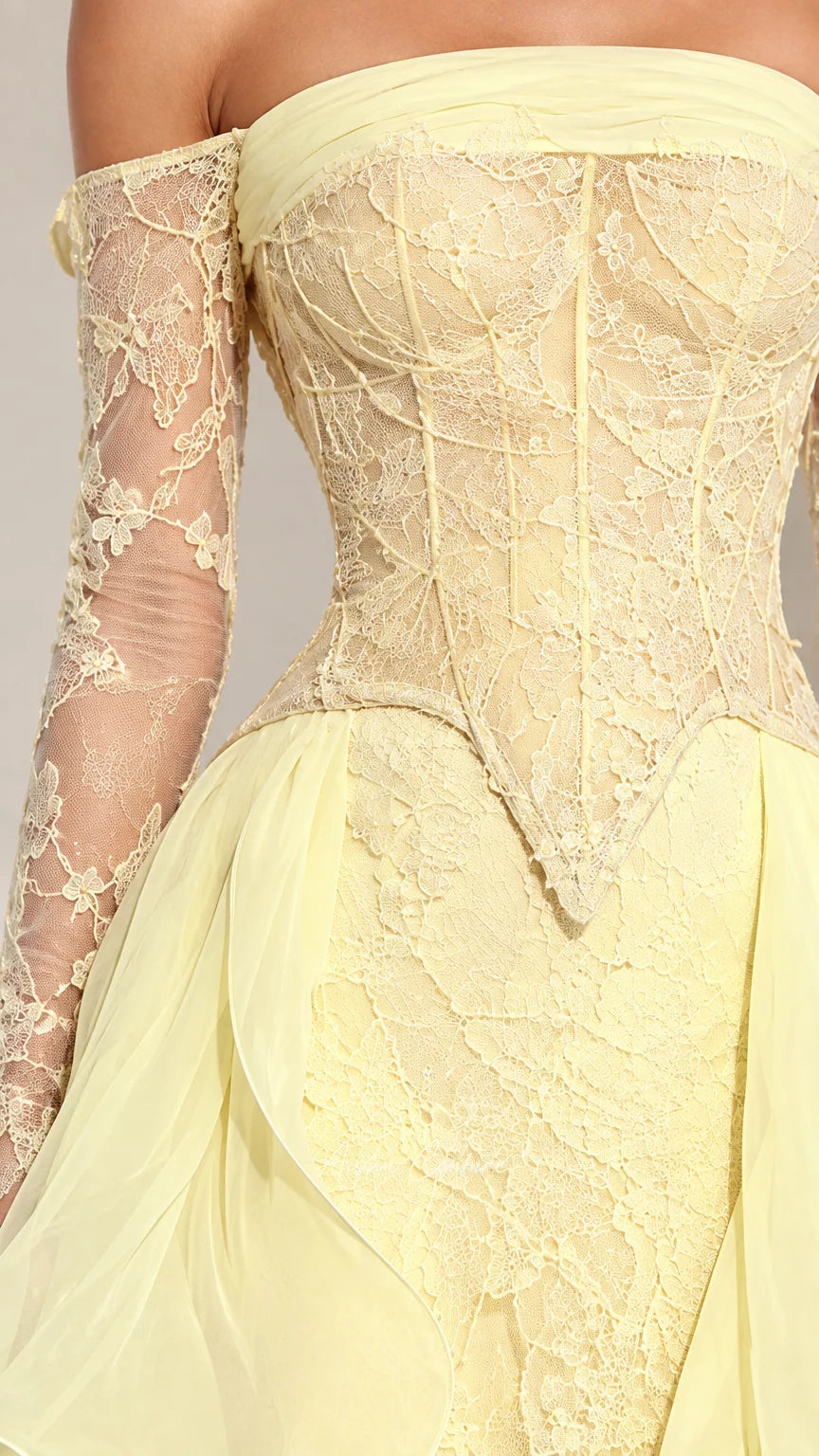 Close-up detail of lace basque corset bodice with visible boning