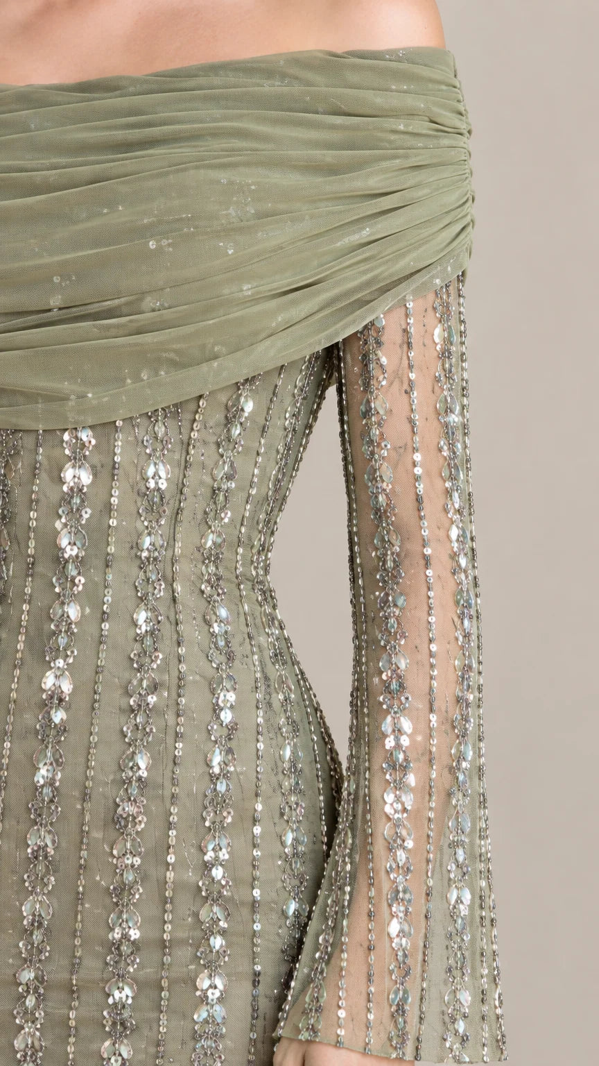 Close-up of Sage Green gathered off-the-shoulder neckline and linear sequin fabric