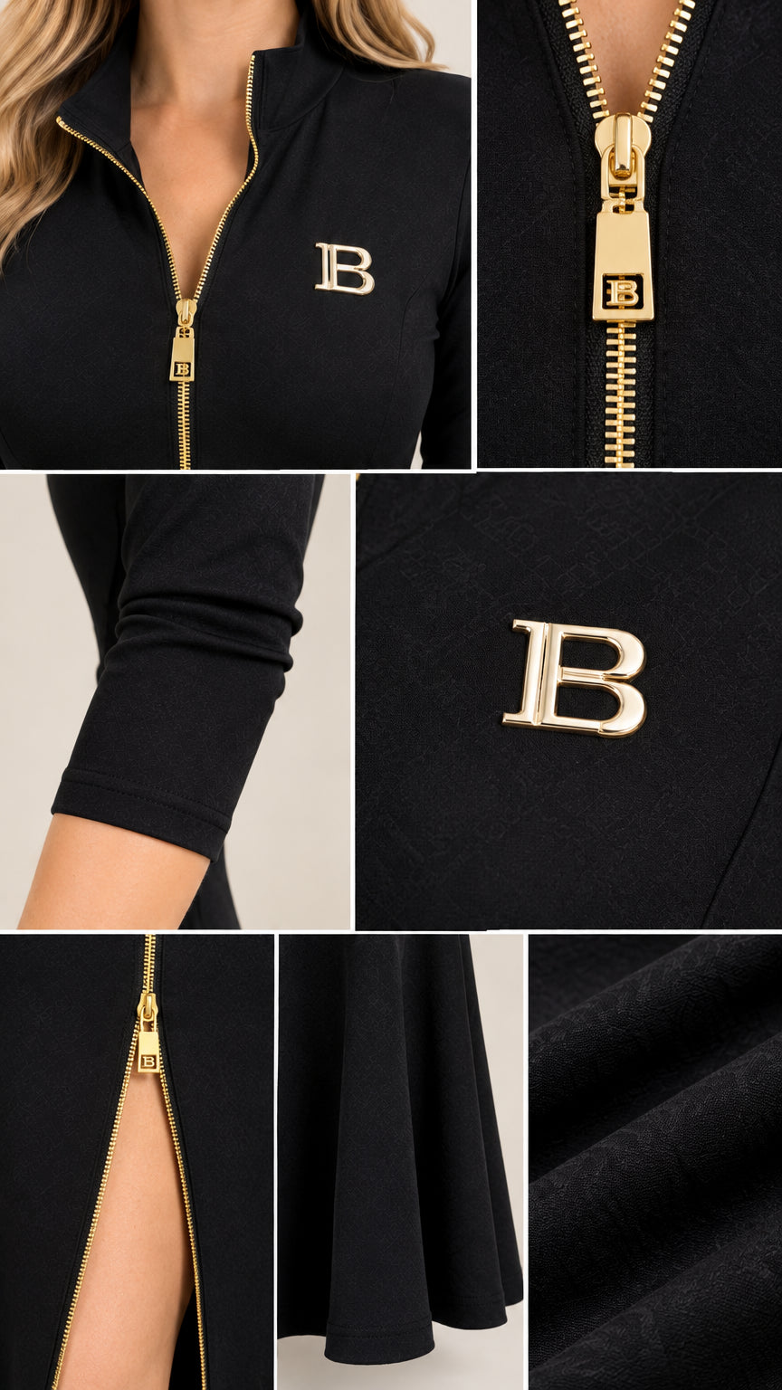 Close-up details of gold-tone zipper, neckline, sleeve, and emblem hardware
