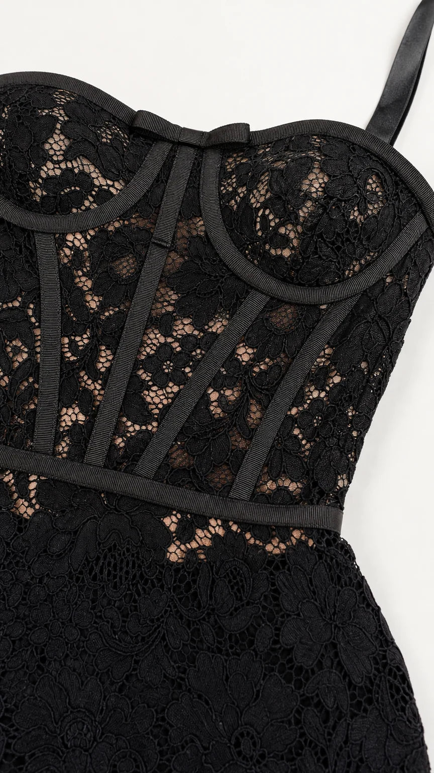 Close-up detail of structured corset bodice and floral lace