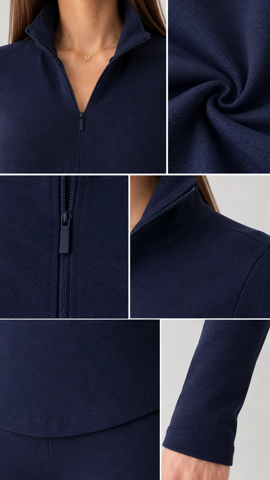 Close-up details of navy blue half-zip collar, zipper pull, and soft knit fabric texture