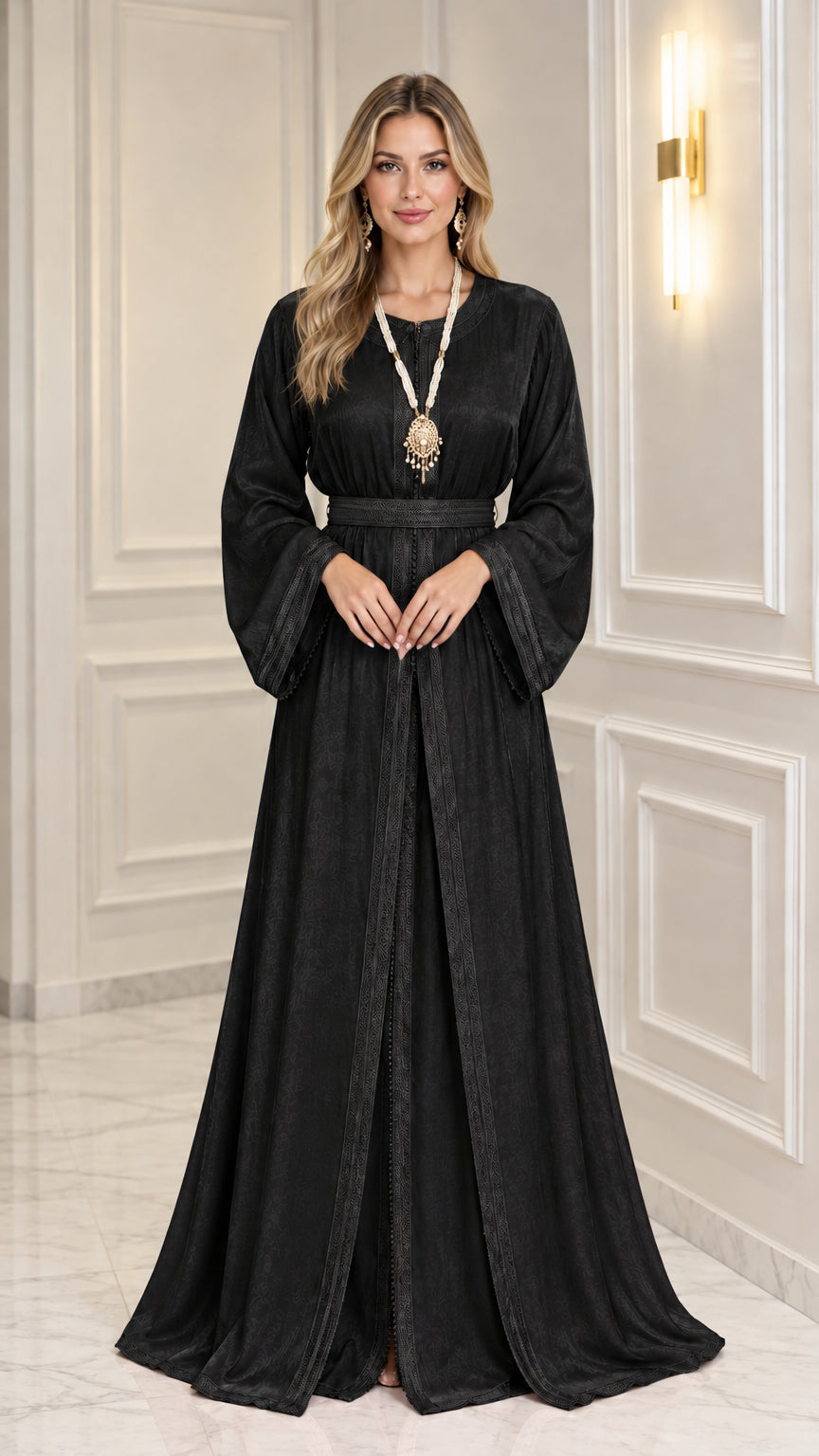 Front view of woman wearing Black satin kaftan maxi dress with belt