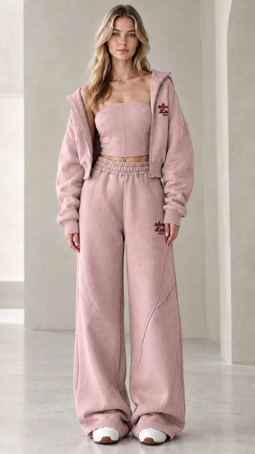 Full front view of model wearing the dusty pink 3-piece fleece tracksuit set