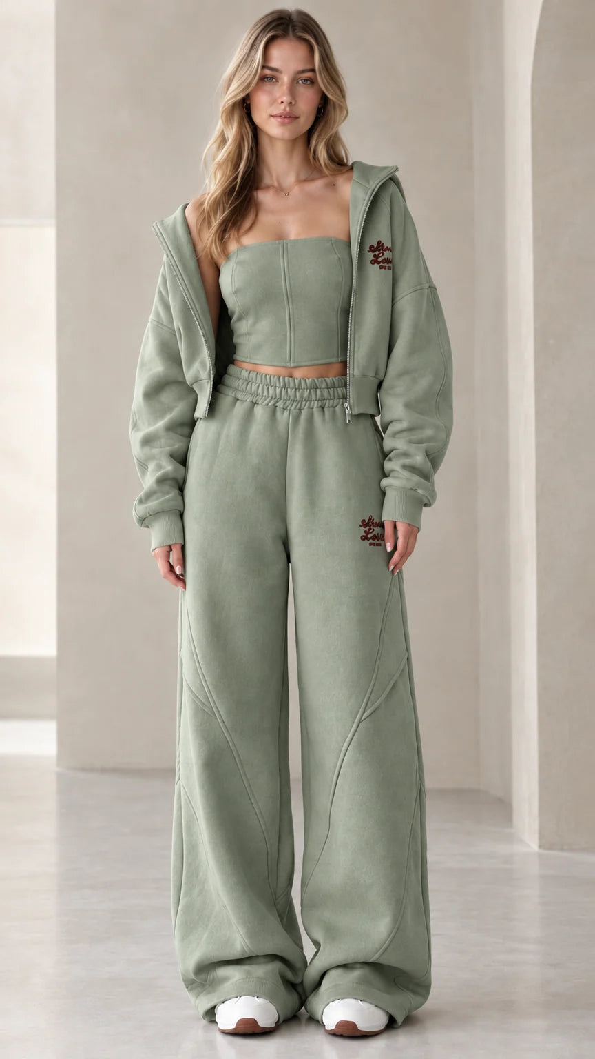 Full front view of model wearing the sage green 3-piece fleece tracksuit set
