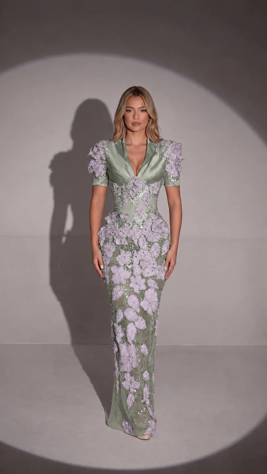 Front view of sage green 3D floral appliqué embellished evening gown