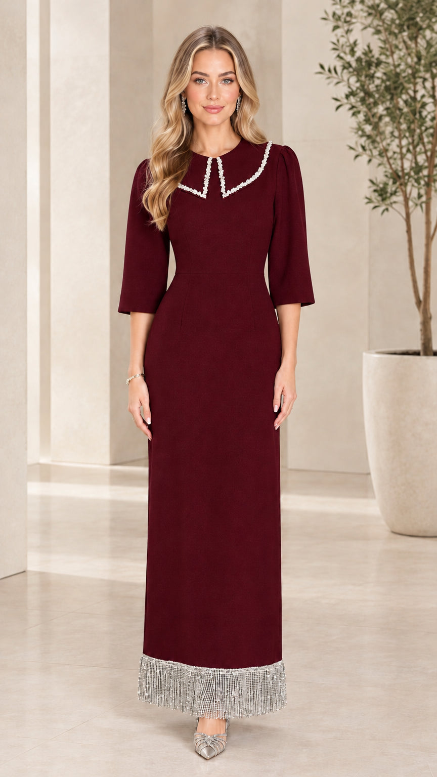 Burgundy formal evening dress with beaded collar and tassel hemline