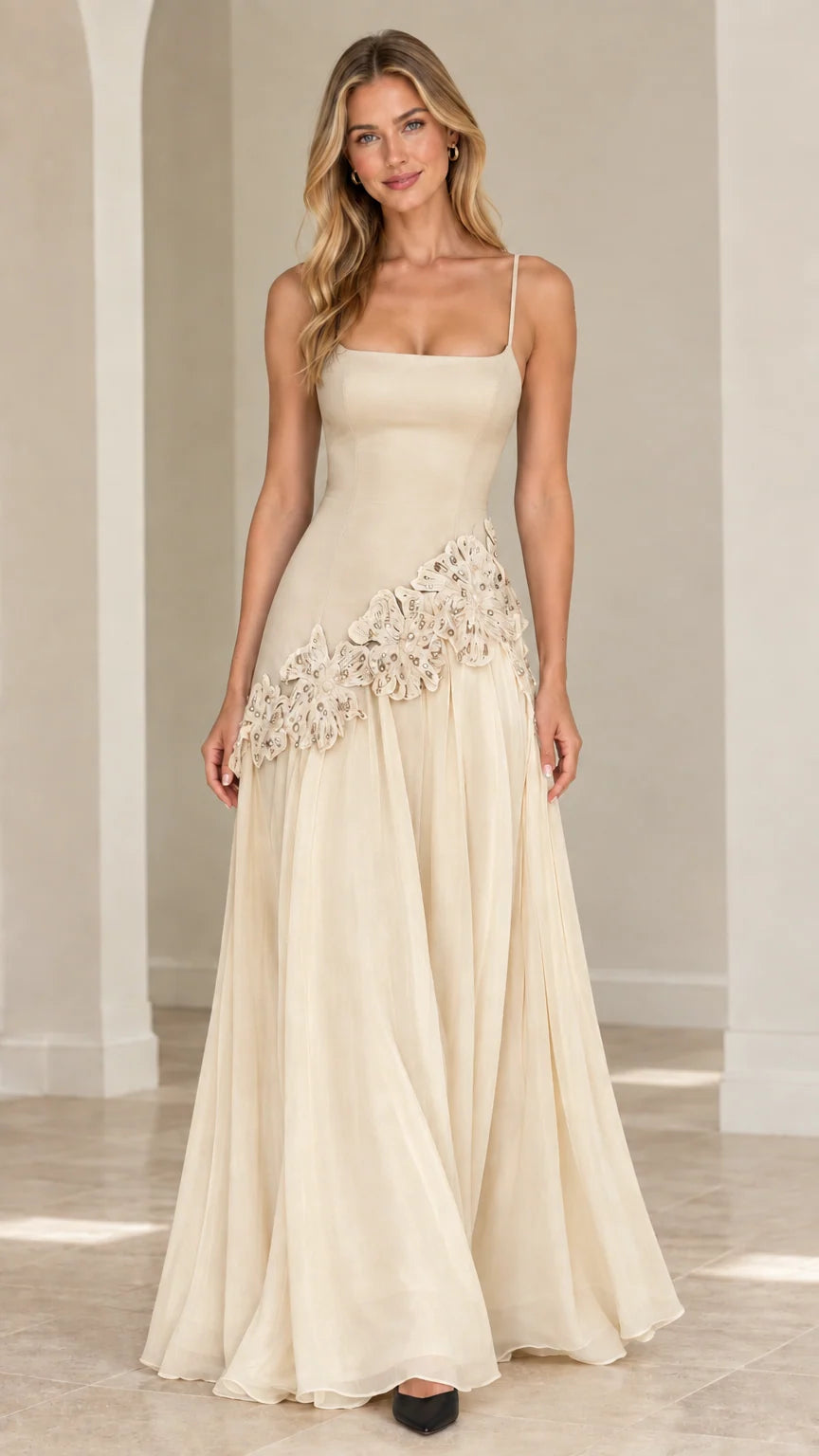 Full-length monochrome champagne cream evening gown with delicate lace embellishment